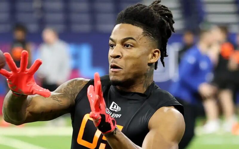 Isaiah Bond sprinting down the sideline after a catch