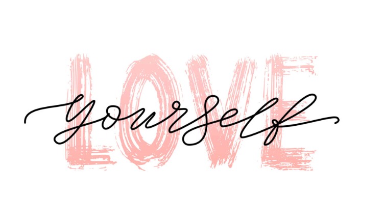 A woman standing strong and confident, symbolizing self-discovery after heartbreak