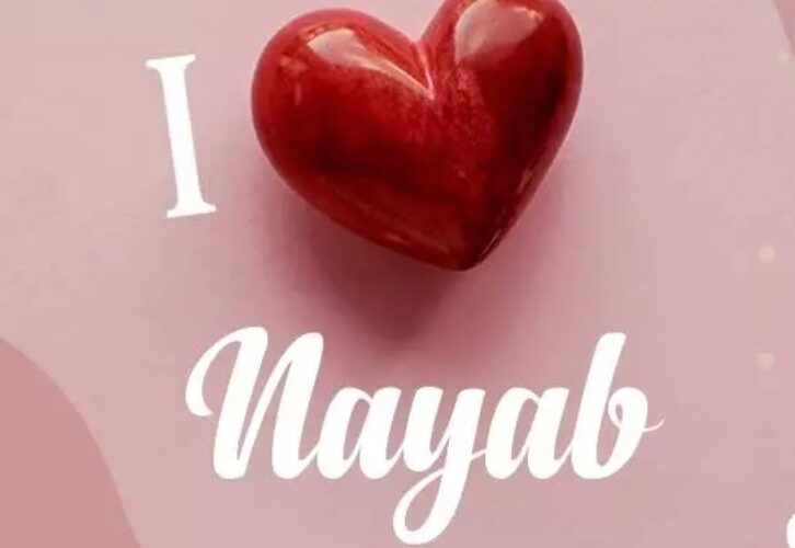 Gohar standing in the village market with a basket on her head, looking determined