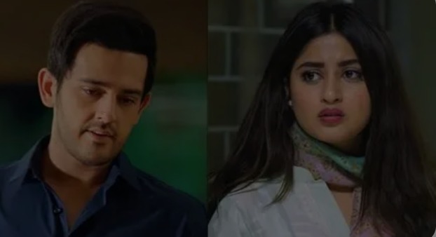 Gohar and Sami having a private conversation in the mansion garden